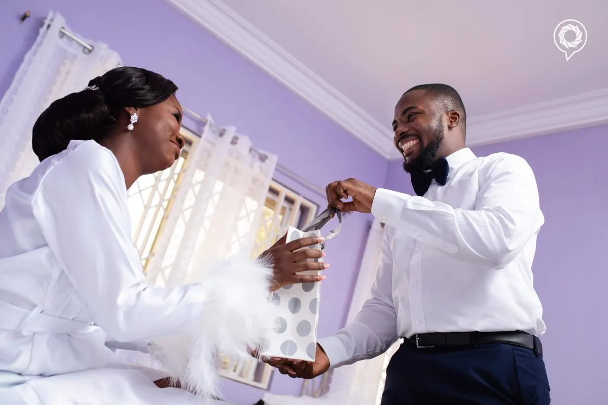 This photo of a best man praying with the groom to calm his nerve is the definition of friendship goals