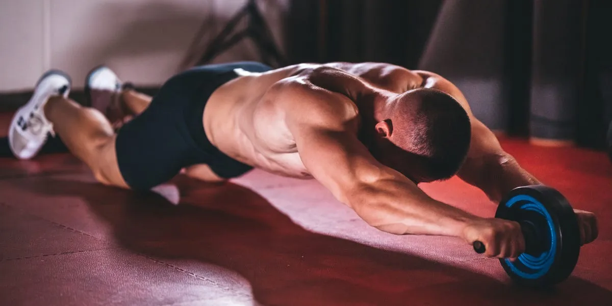 How to Use an Ab Roller to Train Your Core and Build a Six-Pack