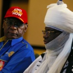 Chairman Nigeria National PolioPlus Committee of Rotary International, Dr. Tunji Funsho and Emir of Jiwa HRH Idris Musa are seen during a news conference marking the 3-year-polio-free milestone in Abuja
